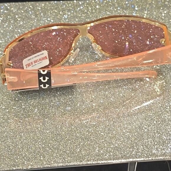 True Religion Rimless Wraparound Sunglasses- Pink Acetate main image 11